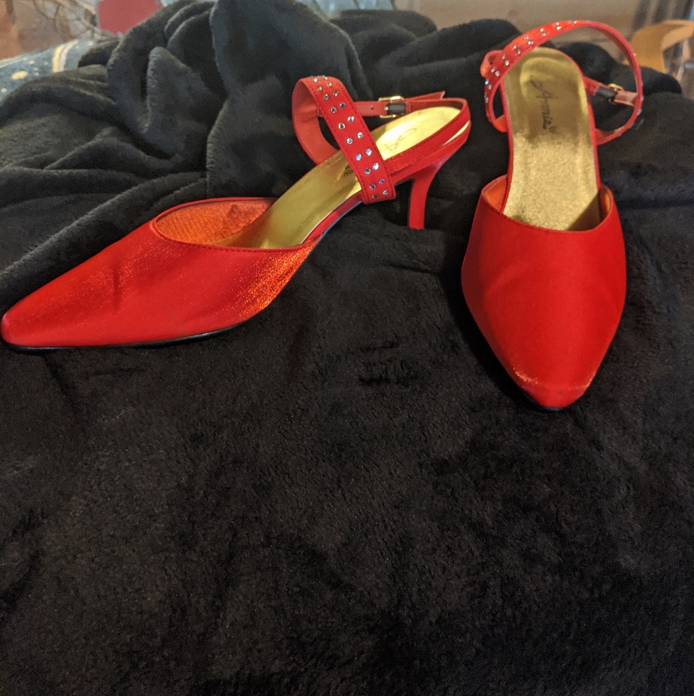 Red heels by Annie